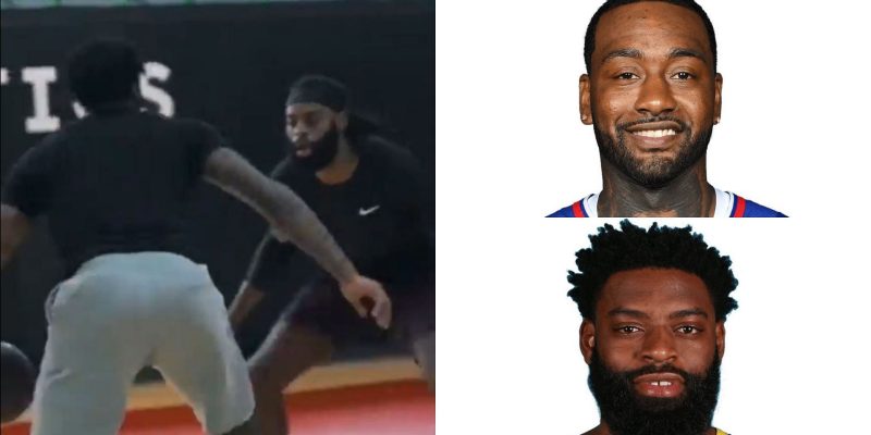 Der aufgeregte John Wall und Tyreke Evans zwitschern einander an, während sie in einem offenen Kampf im Fitnessstudio die Eimer tauschen